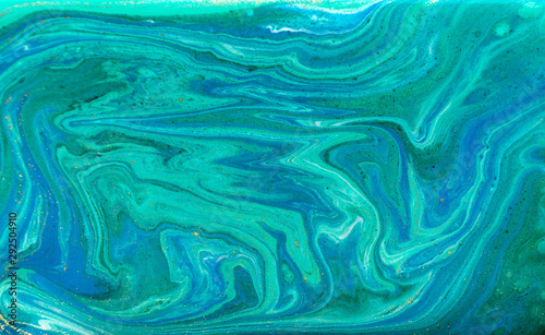 Green and blue agate ripples. Golden glitter marble texture. © anya babii