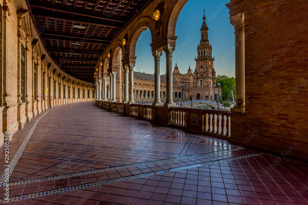 Corridor, tower and arcs in Plaza de España, in Seville