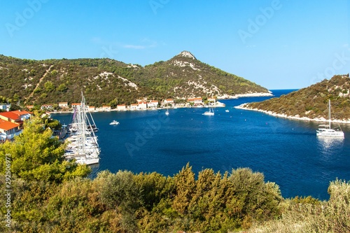 Bay Zaklopatica on the Croatian island of Lastovo. Sailboat in the bay. Holiday in Croatia. Old harbor.
