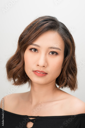 Close up young Asian woman portrait on white background