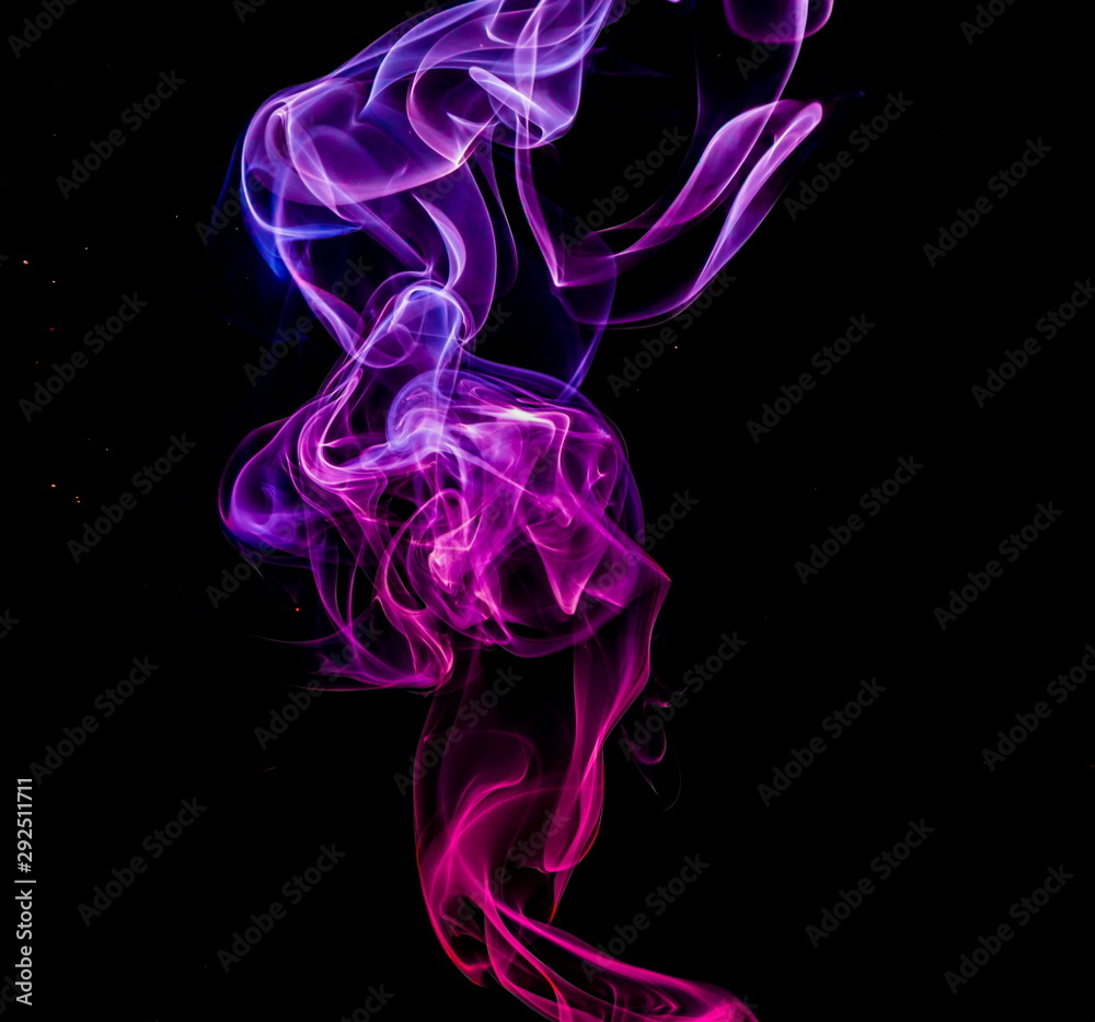 Colored smoke on black background