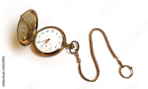old retro vintage style golden savonette pocket watch with watch chain isolated on white background