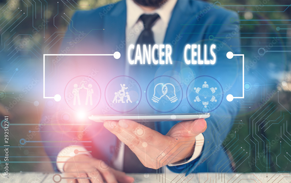 Writing note showing Cancer Cells. Business concept for forming solid tumors or flooding the blood with abnormal cells Male wear formal work suit presenting presentation smart device Writing note showing Cancer Cells. Business concept for forming solid tumors or flooding the blood with abnormal cells Male wear formal work suit presenting presentation smart device