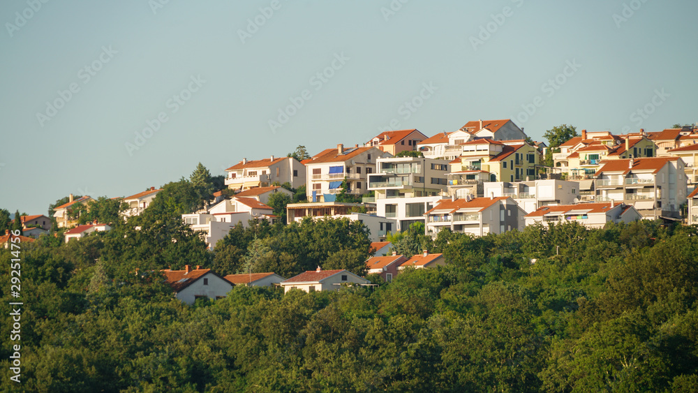 The evening sun illuminates the apartments of the spa area of Nyivice on the island of Krk