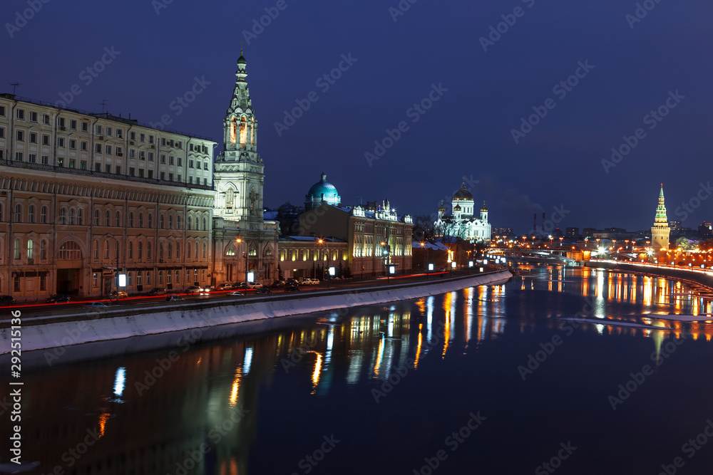View of the night winter Moscow with the Moscow river, Sofiyskaya and Kremlevskaya embankments. Russia