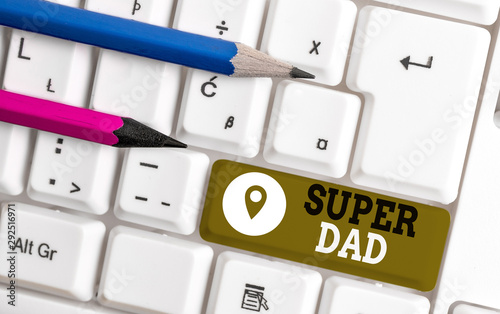 Handwriting text Super Dad. Conceptual photo Children idol and super hero an inspiration to look upon to White pc keyboard with empty note paper above white background key copy space photo