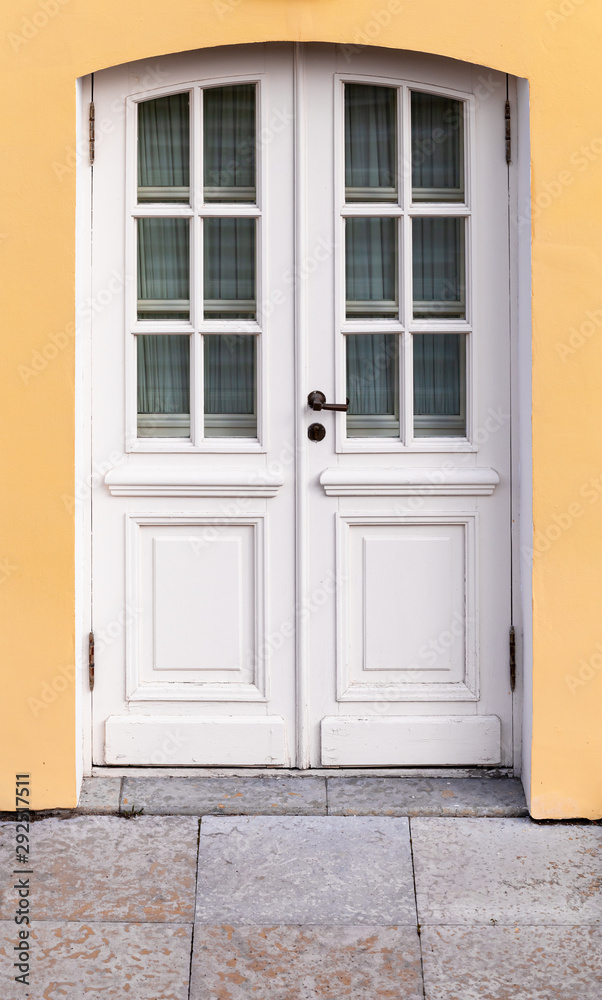 Classic white wooden door with small windows