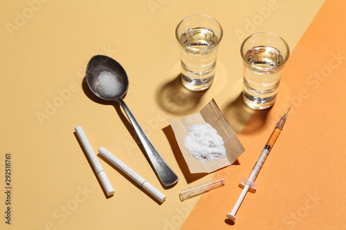 cocaine in paper and equipment on color background  Background from cocaine party