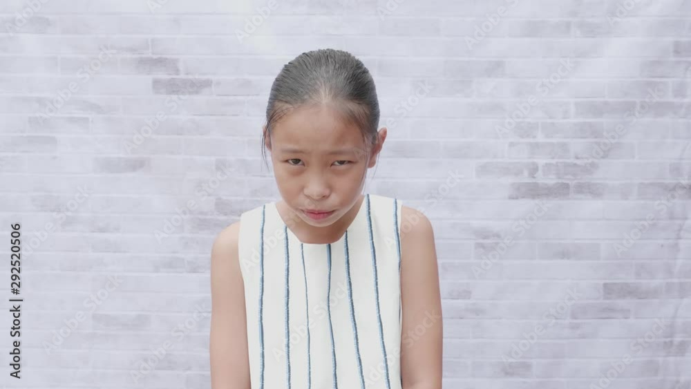 Girl feeling awkward and sorry as confessing in making mistake hum and haw with sorrow distressed, looking worried or nervous. Girl feeling awkward and sorry as confessing in making mistake hum and haw with sorrow distressed, looking worried or nervous.
