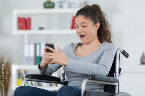 Cuadro en lienzo woman on the wheelchair with euphoric expression
