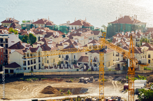 Aerial view of construction site, construction of new building in residential area