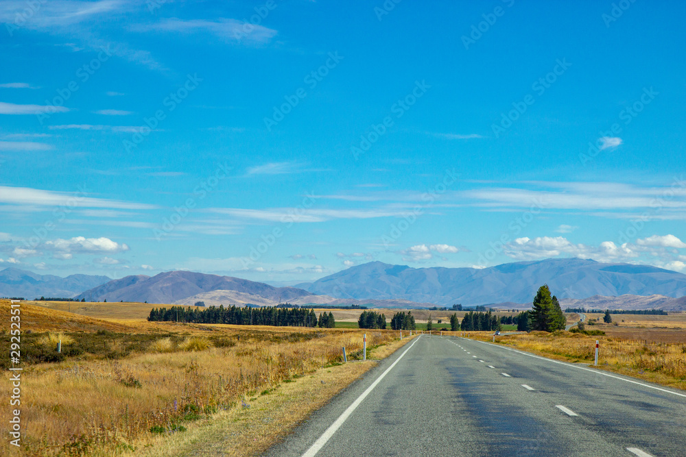 asphalt road through Canterbury region of New Zealand