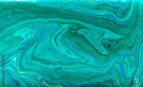 Green and blue agate ripples. Golden glitter marble texture.