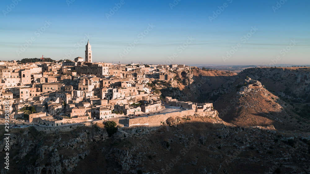 Matera, Italy - August 2019: View of the ancient city of Matera from the Belvedere of Murgia Timone, at the dawn of a day in August 
