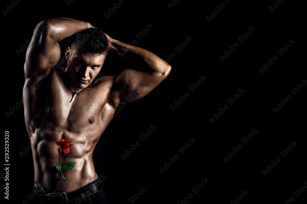 portrait muscular man on black background