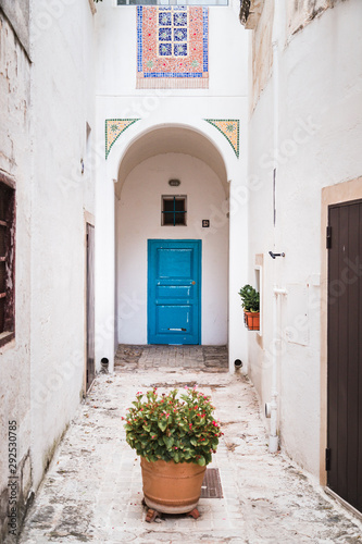 Grottaglie, Italy - August 2019: Historic center of Grottaglie in Puglia during a morning in August © Jan Cattaneo