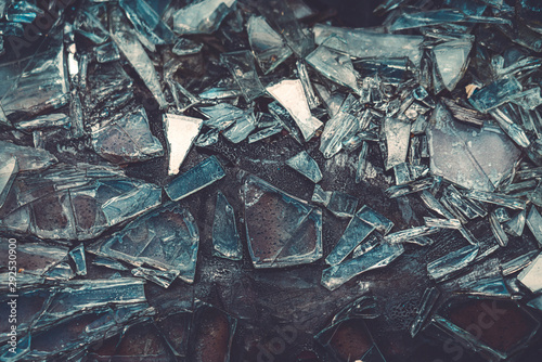 pieces of glass sticking to a scorched surface