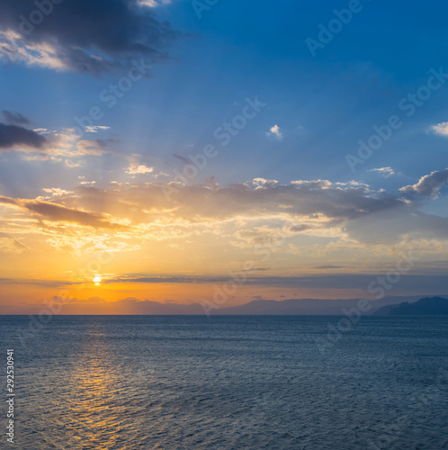 beautiful dramatic sunset over the sea bay, natural background