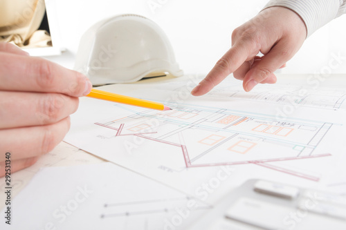 Architects working on blueprint, real estate project. Architect workplace. Construction concept. Engineering tools.