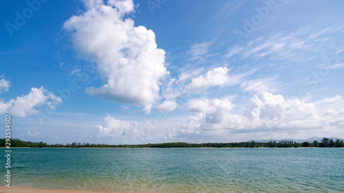 Tropical sea with clear blue sky and white clouds