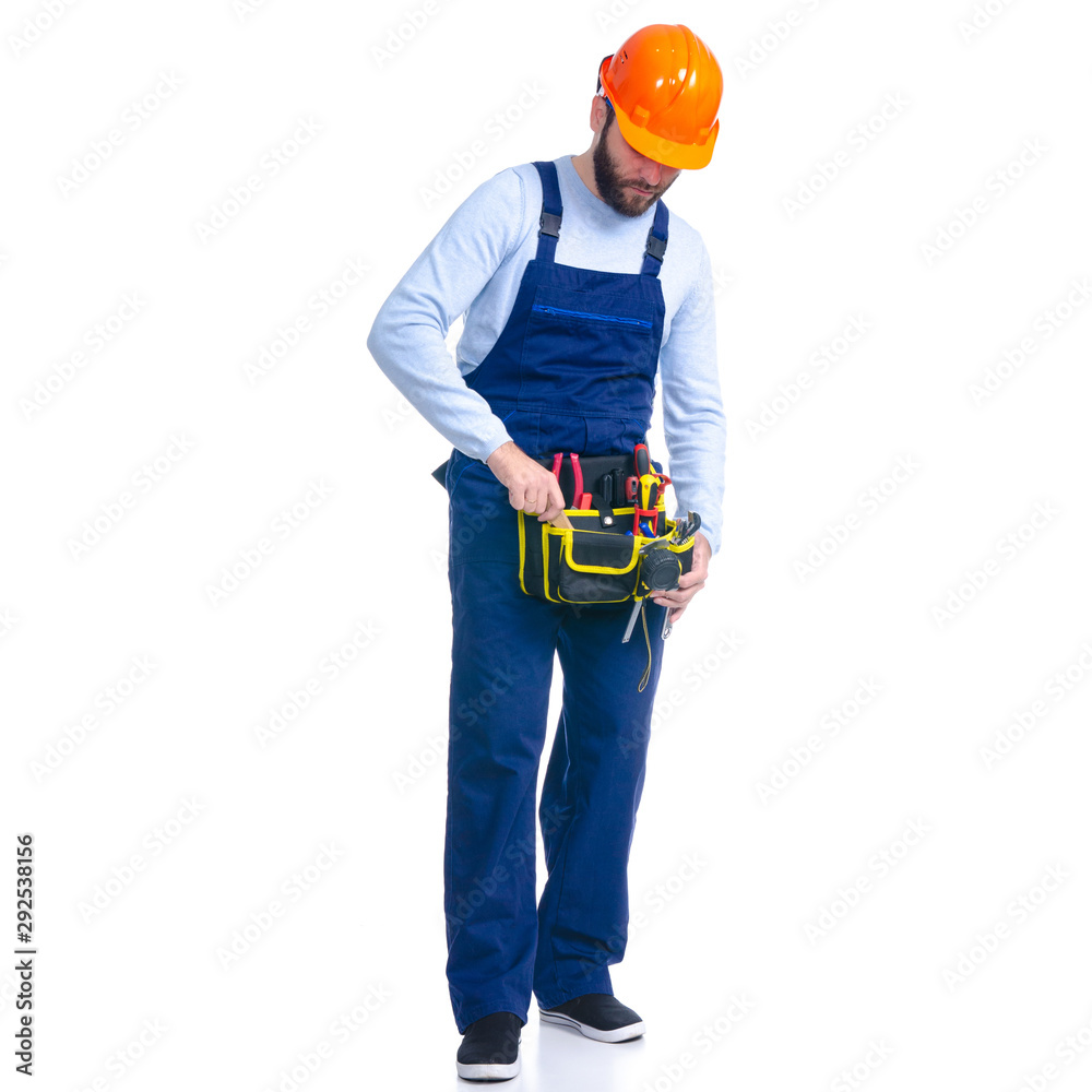 Man worker builder with helmet and tool belt on white background isolation Man worker builder with helmet and tool belt on white background isolation