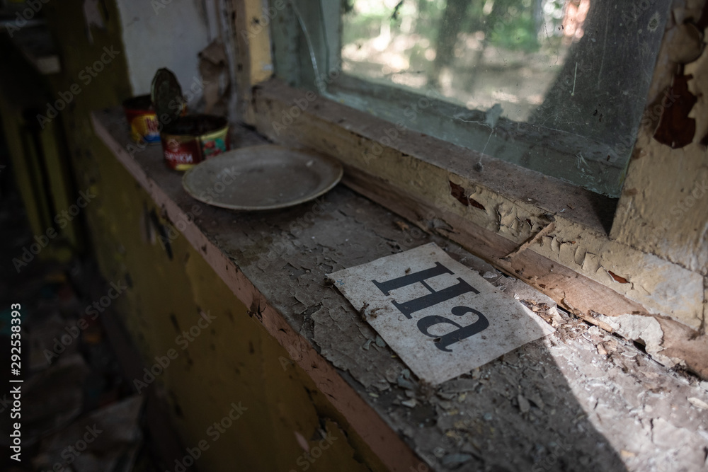 Phonetic cue cards on window sill of abandoned building Phonetic cue cards on window sill of abandoned building