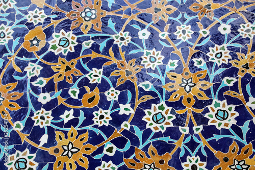 Colorful mosaic and ceramic tiles in the traditional Persian style on the wall Tomb of Sheikh Safi al-Din, Ardabil, northern Iran.