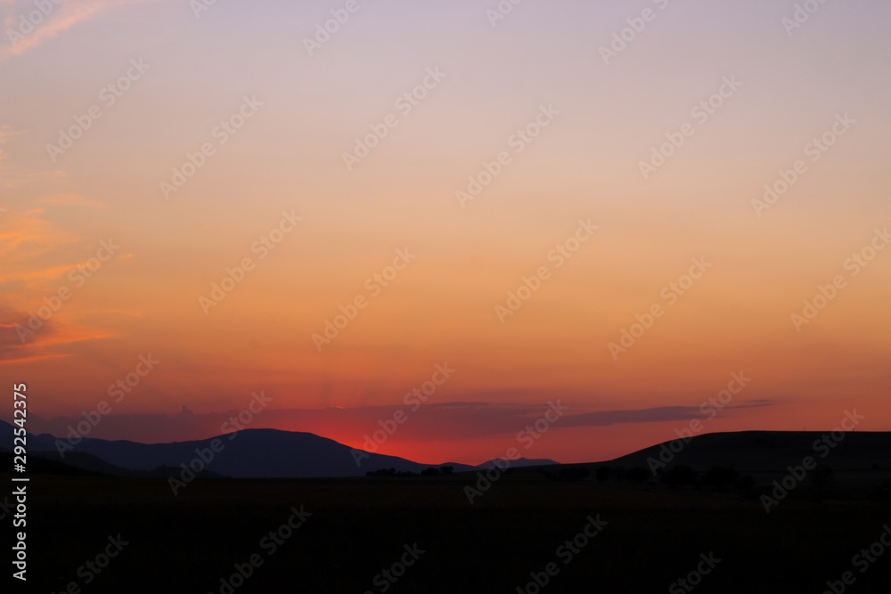 Mountains silhouette and sunset sunbeams. Mountains silhouette and sunset sunbeams.