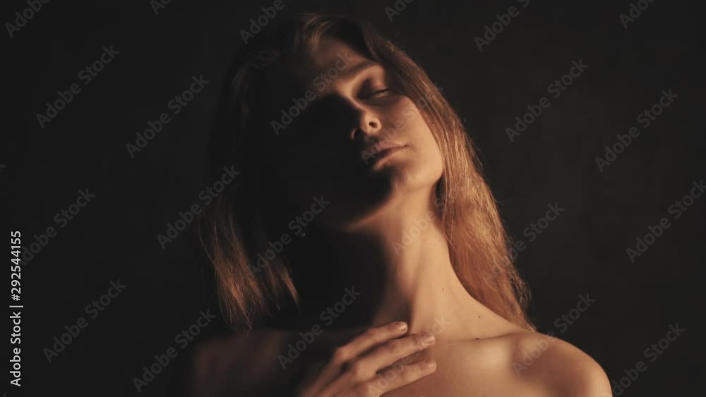 Portrait of sensual woman on black background Portrait of sensual woman on black background
