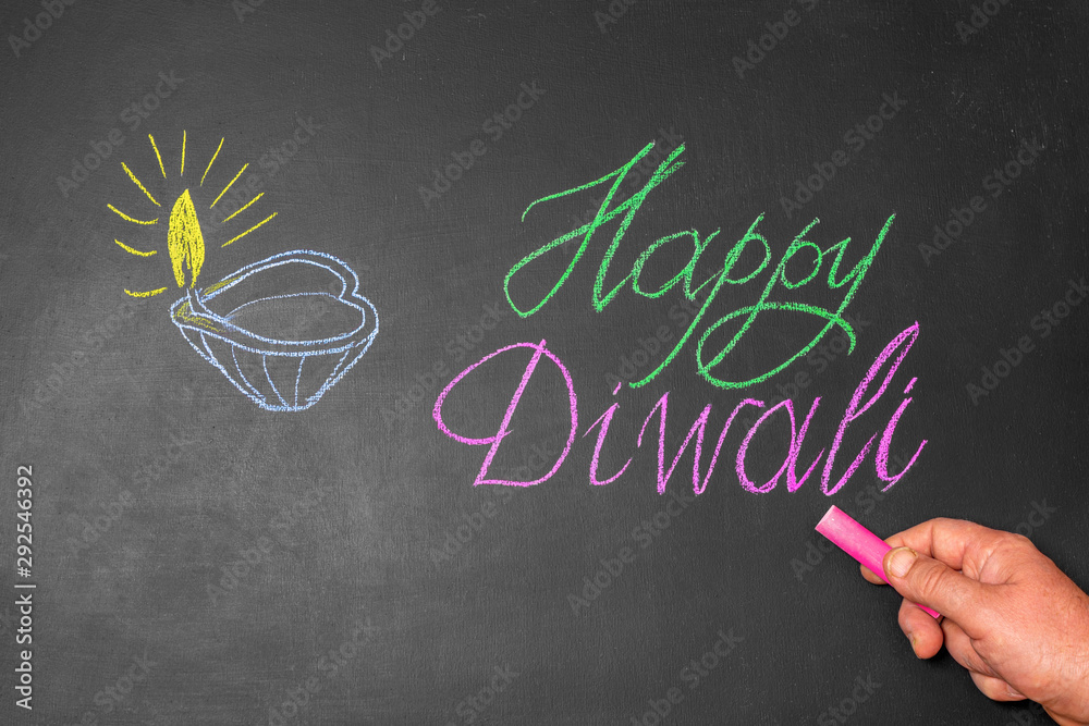 Chalkboard inscription happy diwali. The festival of lights.