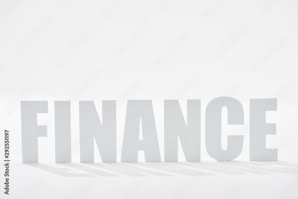 finance inscription with shadows on white background finance inscription with shadows on white background