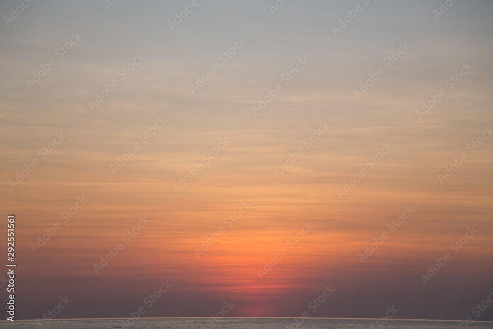 Sunset on the ocean; sky gradient texture