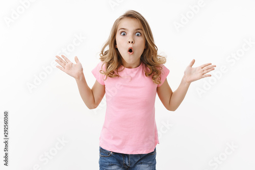 Canvas Print Amazed overwhelmed young kid cute blond girl explain parents incredible news, ge