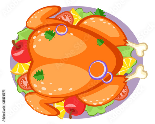 Roasted turkey in a plate with village, apples and lemon on a white. The view of the top.