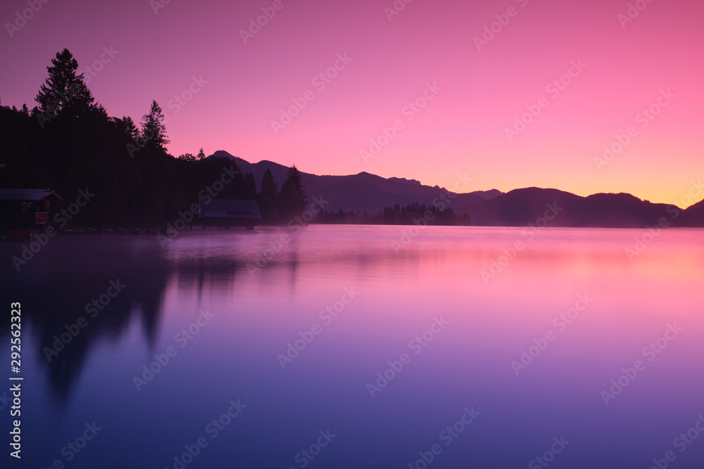 Sunrise over a lake in the Alps Sunrise over a lake in the Alps