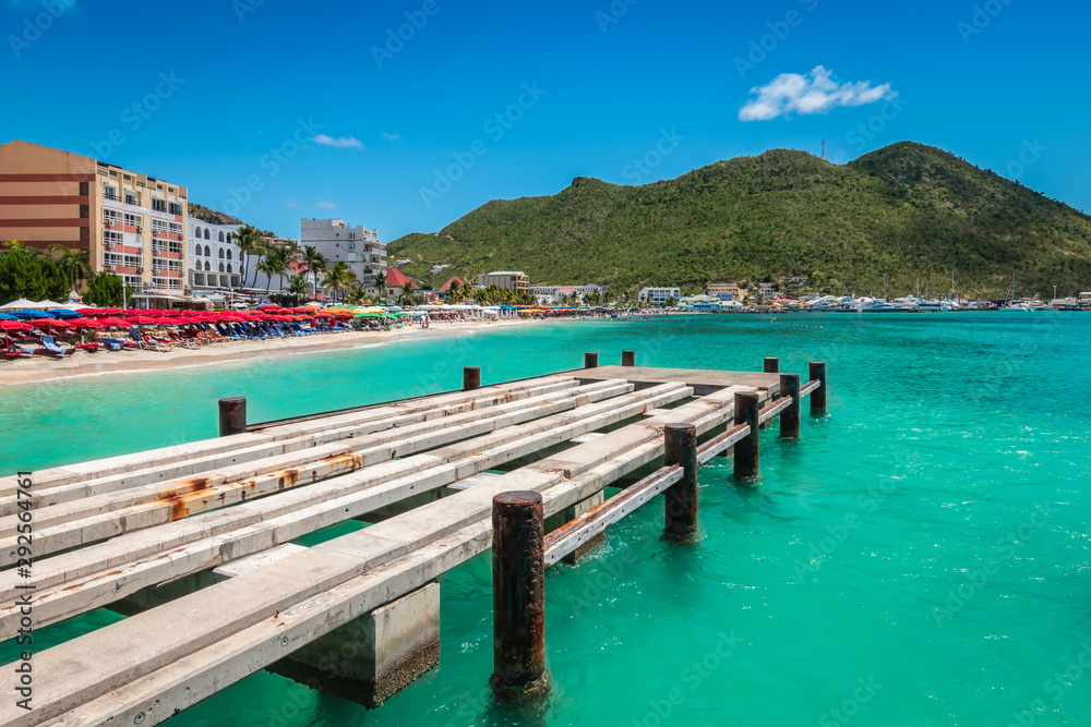Wooden pier at Great Bay beach in Philipsburg, Sint Maarten, Caribbean.