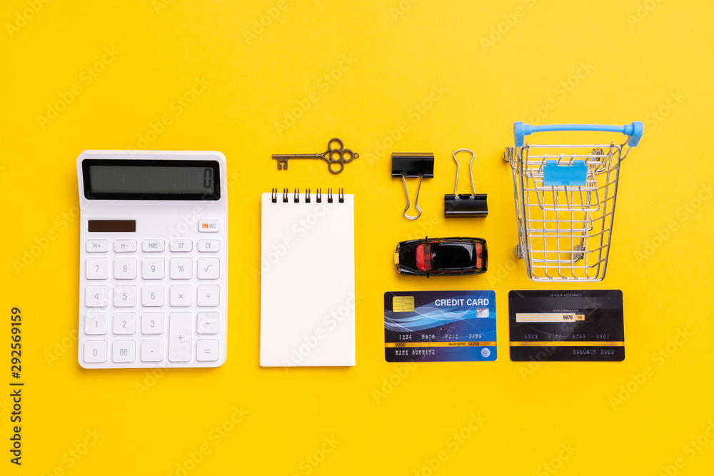 Online payment concept with shopping cart top view Online payment concept with shopping cart top view