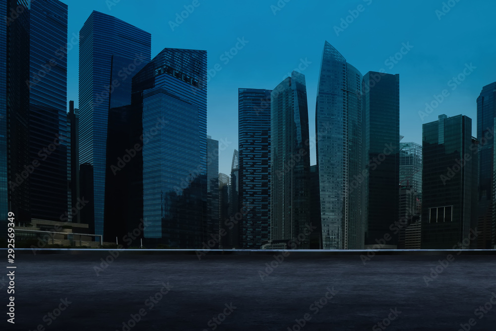 Singapore urban cityscape skyline night scene with empty loft cement floor on front.