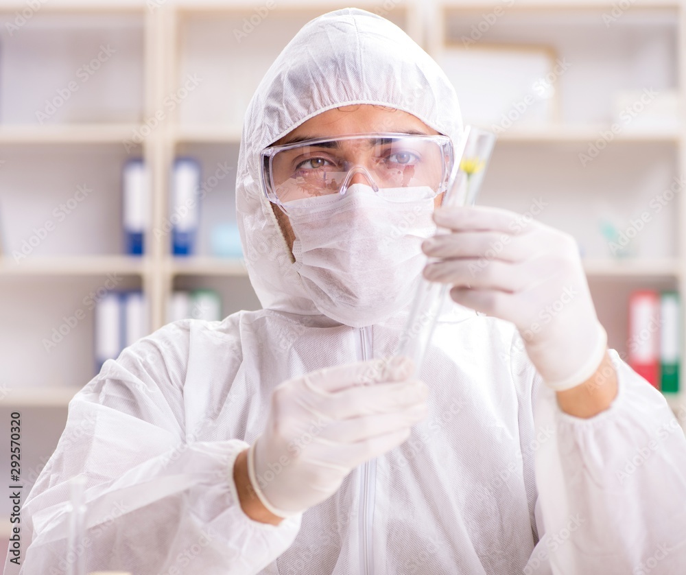 The biotechnology scientist chemist working in lab The biotechnology scientist chemist working in lab