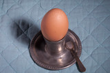 Soft-boiled egg on a silver stand