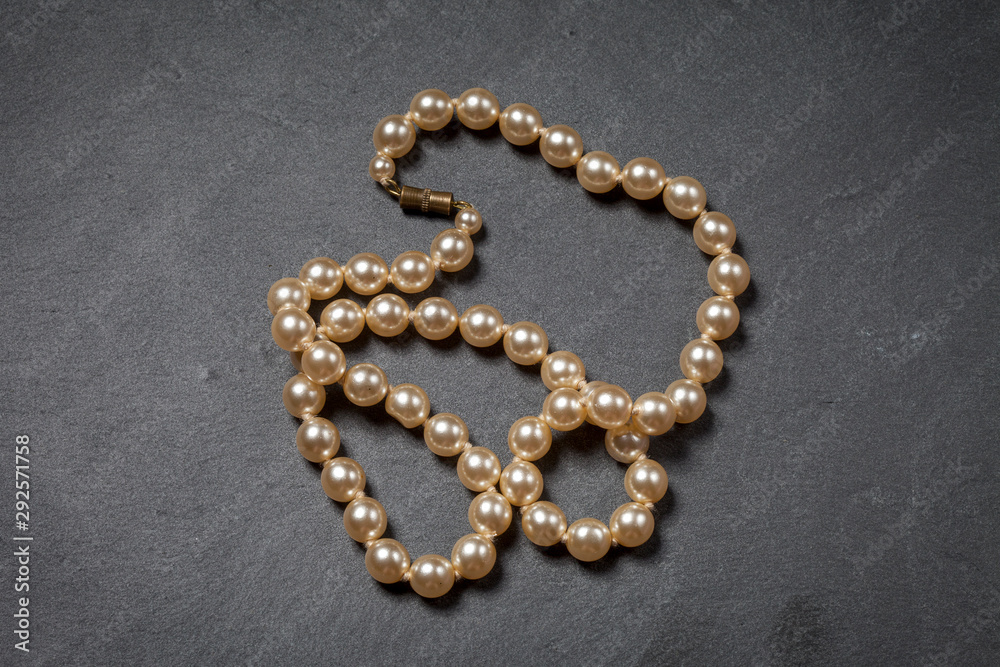 Pearl necklace on a black background Pearl necklace on a black background