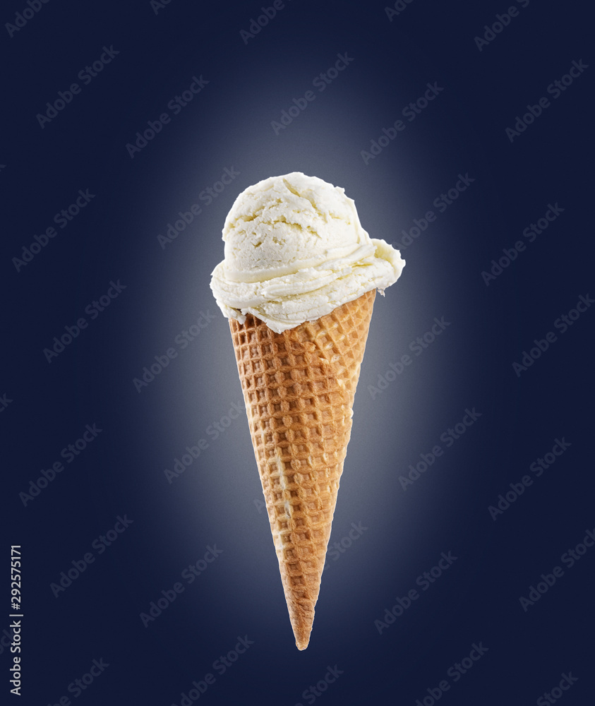 Vanilla ice cream scoop with cone on blue background