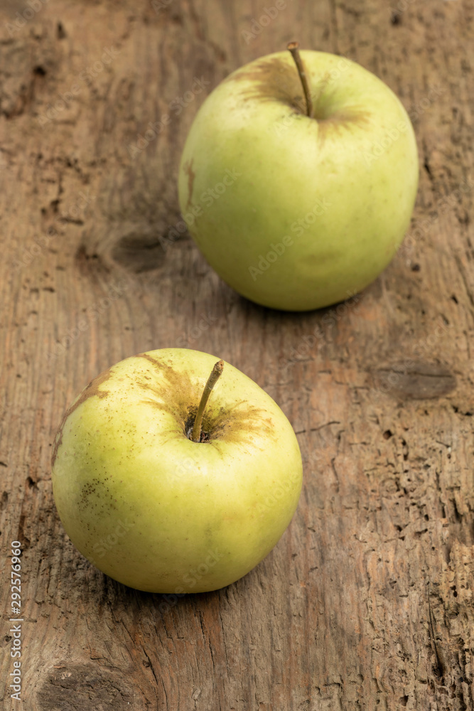 natural and healthy green apples on wooden table natural and healthy green apples on wooden table