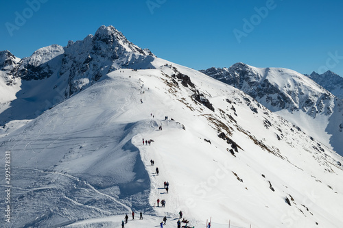 Winter landscape on Kasprowy Wierch mountain, beautiful view of other peaks in Tatra Mountains, near Zakopane