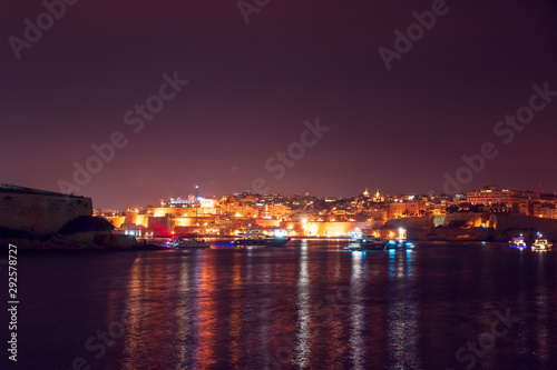 Night view Valletta Malta, stone fortress. Travel concept