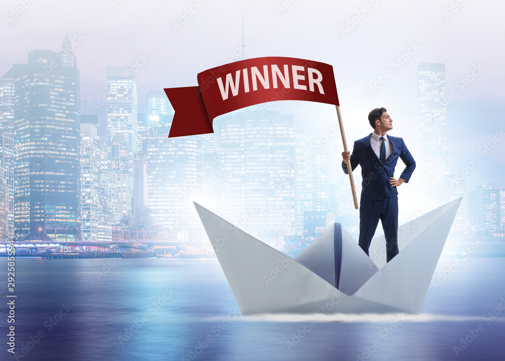 Obraz premium Businessman riding paper boat ship in winning concept