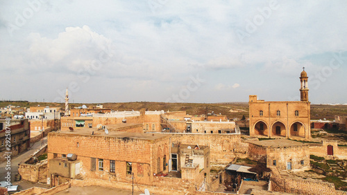 Mardin city with its traditional brown stone houses and ancient landscape in Mardin