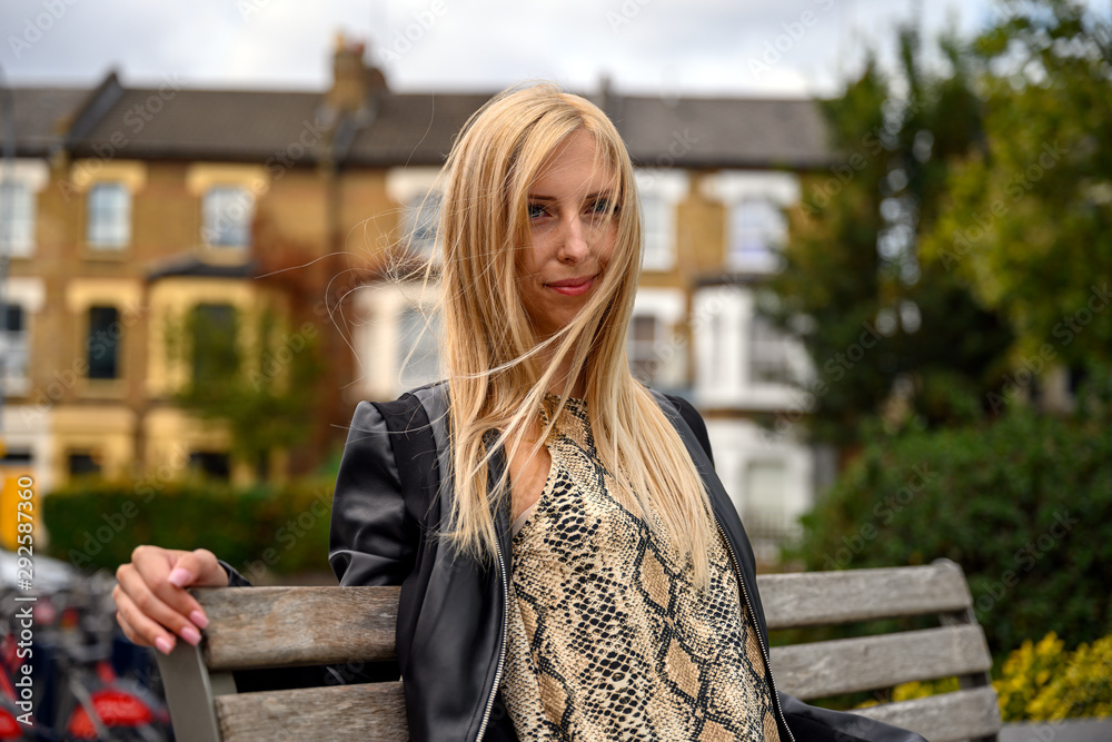 Close up portrait of an attractive young London garden suburb woman Close up portrait of an attractive young London garden suburb woman