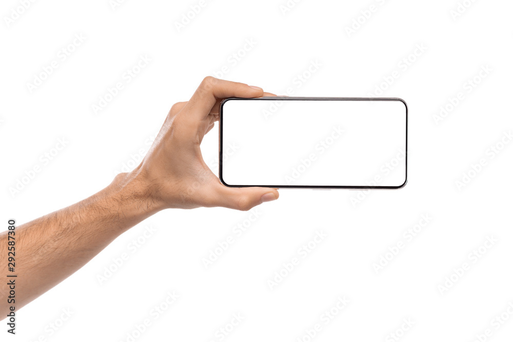 Smartphone with blank screen in horizontal orientation in male hand Smartphone with blank screen in horizontal orientation in male hand