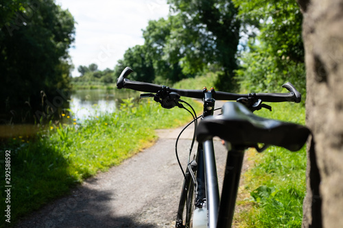 bicycle on the canal towpath summer sunshine